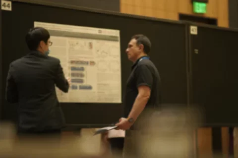 Trainee presenting during poster session