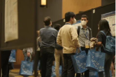 retreat poster session of students walking around and observing 