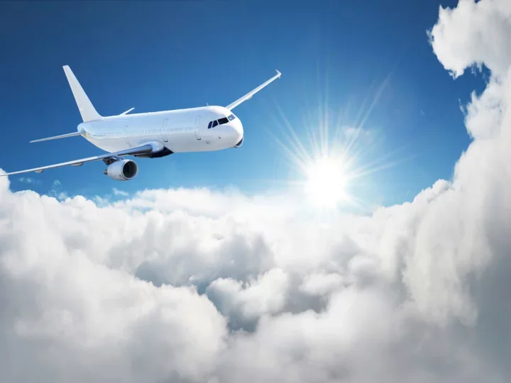 Airplane flying in the clouds