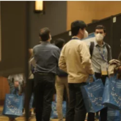 retreat poster session of students walking around and observing 